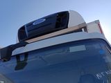 a truck with a roof rack on top of it
