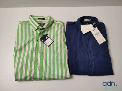 two men ' s shirts with green and white stripes on them