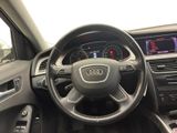 the interior of a car with a steering wheel and dashboard controls