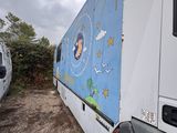 a truck that has a mural on the side of it