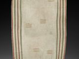 un tapis rayé blanc et vert, avec des rayures rouges et vertes