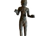 statue of a man holding a cup in his right hand