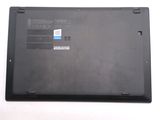 a black laptop with a blue sticker on the back of it
