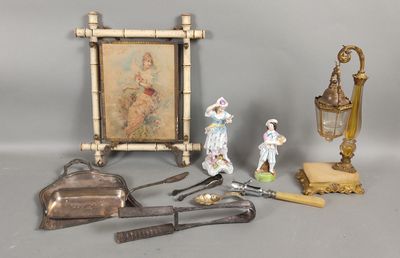 a picture of a picture of a man and a woman on a table with other items