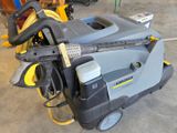 a machine that is sitting on the floor in the garage