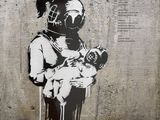 a picture of a stencil of a woman holding a baby