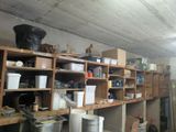 a room filled with lots of shelves and bins
