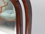 a mirror that is sitting on a table