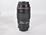 a large camera lens sitting on a white surface