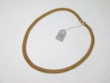 une photo d'un collier en or muni d'une étiquette