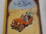 an old children ' s book with a picture of a jeep driving through the desert