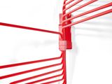 a red coat rack with six red coats hanging on it