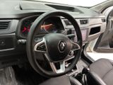 the interior of a car with a steering wheel and dashboard controls