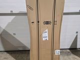 a large cardboard box sitting on the floor in front of a garage door