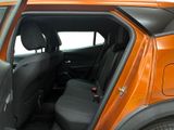 an orange car with its door open and a black seat