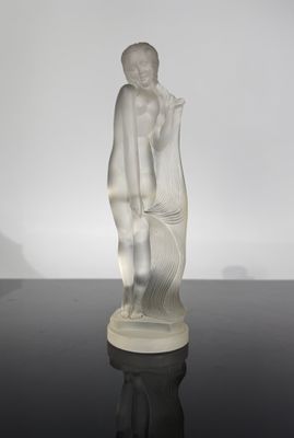 an image of a statue of a woman holding a baby