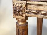 a close up of a wooden table with a drawer on it