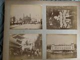 four old black and white photos of a city street and buildings