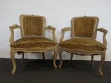 pair of antique chairs with upholstered upholstered arms