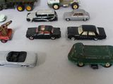 a lot of toy cars that are sitting on a table