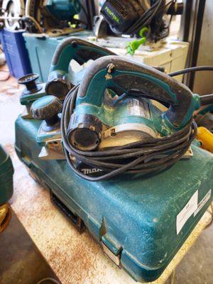 a green machine that is sitting on top of a table
