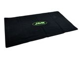 a large black bag with a green logo on it