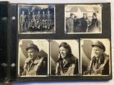 an old black and white photo of a group of people in uniform