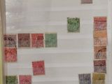 a picture of a wall with stamps on it
