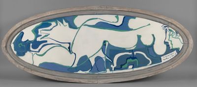 a blue and white plate with a horse design on it