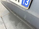 a close up of a license plate on the back of a car