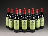 six bottles of red wine are lined up in a row