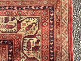 rug on the ground with a cat laying on top of it