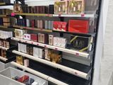 a lot of beauty products on the shelves in the store