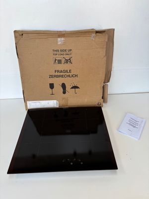 une boîte posée sur une cuisinière