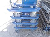 a blue cart that has wheels on it