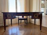 an image of a desk with a chair in front of it