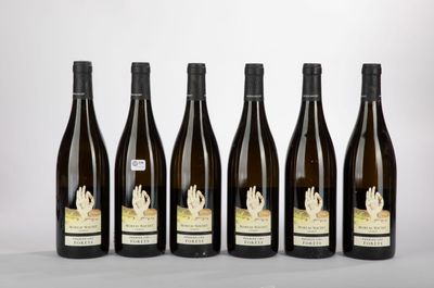 six bottles of wine are lined up in a row