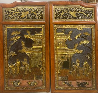 pair of antique chinese carved wood panels with gold leaf designs