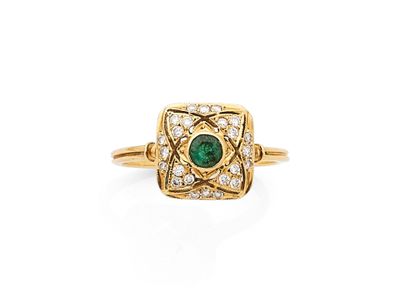 une bague en émeraude et diamant