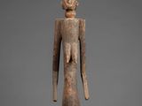 an image of a statue of a person with a body made out of wood