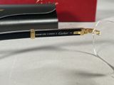 the glasses are black and gold with clear lenses on them
