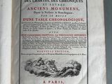 an open book with a picture of a man riding a horse