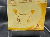 un gros plan d'une boîte sur laquelle figure une figurine de Pokémon