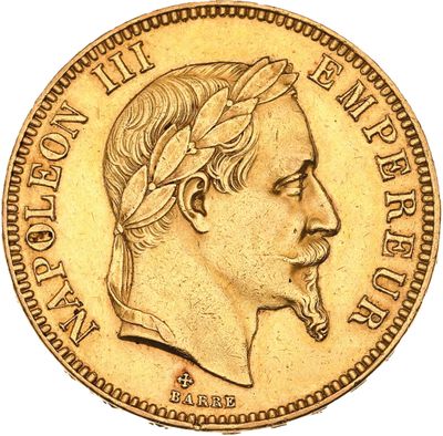 gros plan d'une pièce d'or sur laquelle figure le visage d'un homme