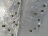 a bag of seeds and a bag of seeds on a table