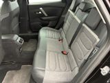 the back seats of a car are empty with no one in it