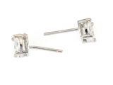 pair of diamond stud earrings on a white background