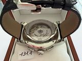 a watch that is in a box on a table