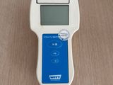 an image of a digital meter on a wooden table