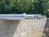 a metal rail that is attached to a wall